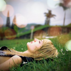 meditate girl lying on grass
